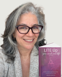 Holistic Coach Mentor and Author Helen Roditis with second edition of her book LITE Up Your work and Life, a mind-body-soul method to lead yourself well.