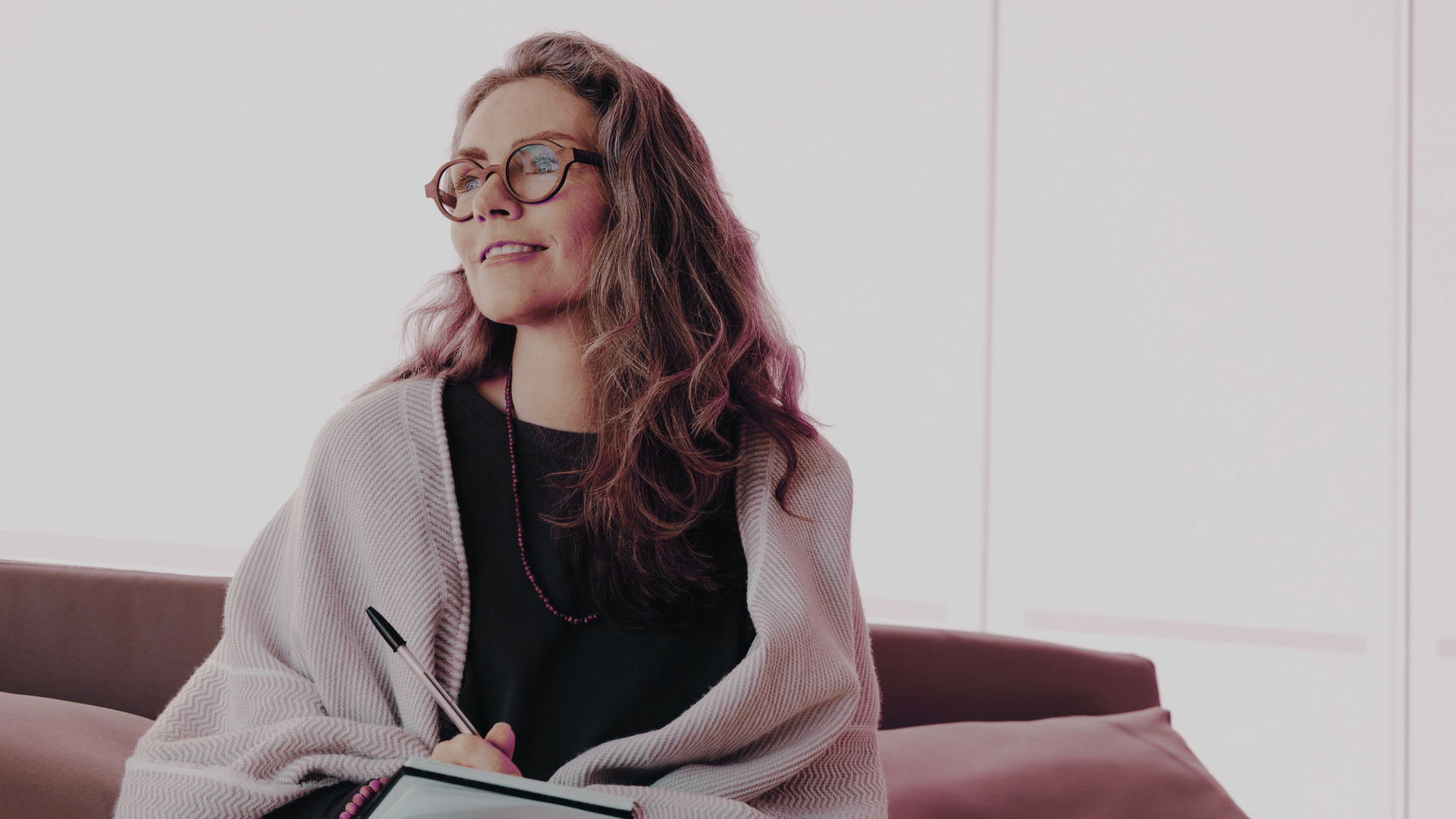 Mid-career professional reflecting about career transition