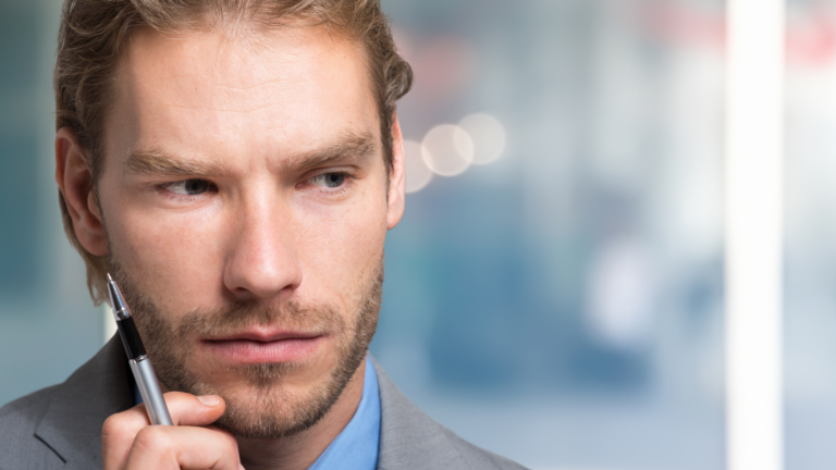 Business leader in deep thought about his success and need to recalibrate and realign