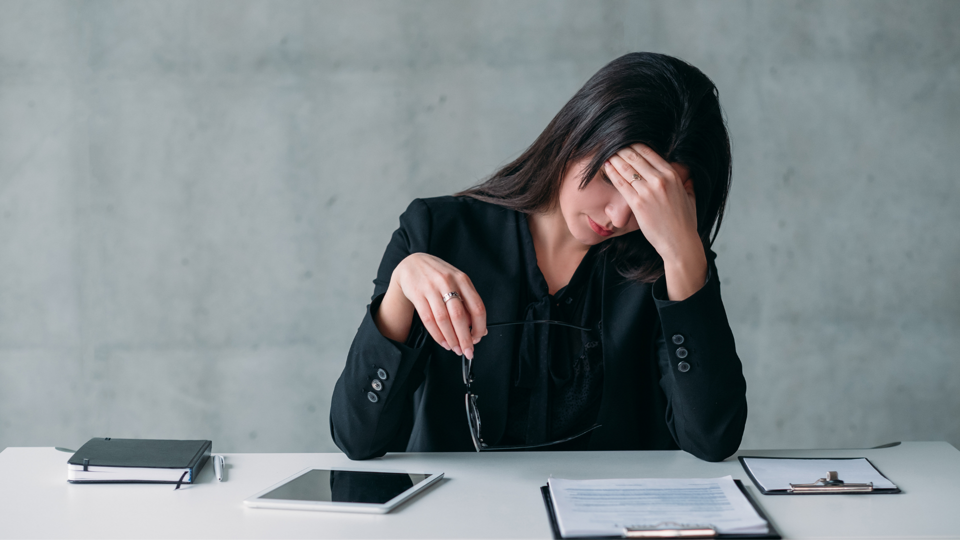Professional woman feeling stuck and pulled to make a change.