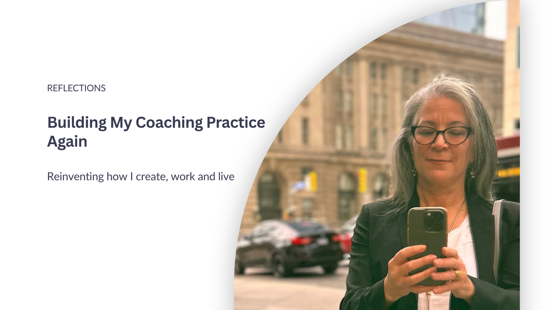Helen Roditis reflected in a rose-coloured city mirror for Building My Coaching Practice Again.