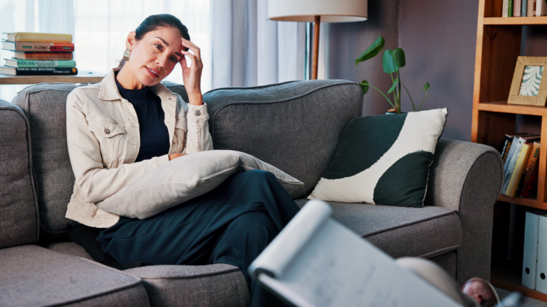 Mid-career woman reflecting on personal and career reinvention.