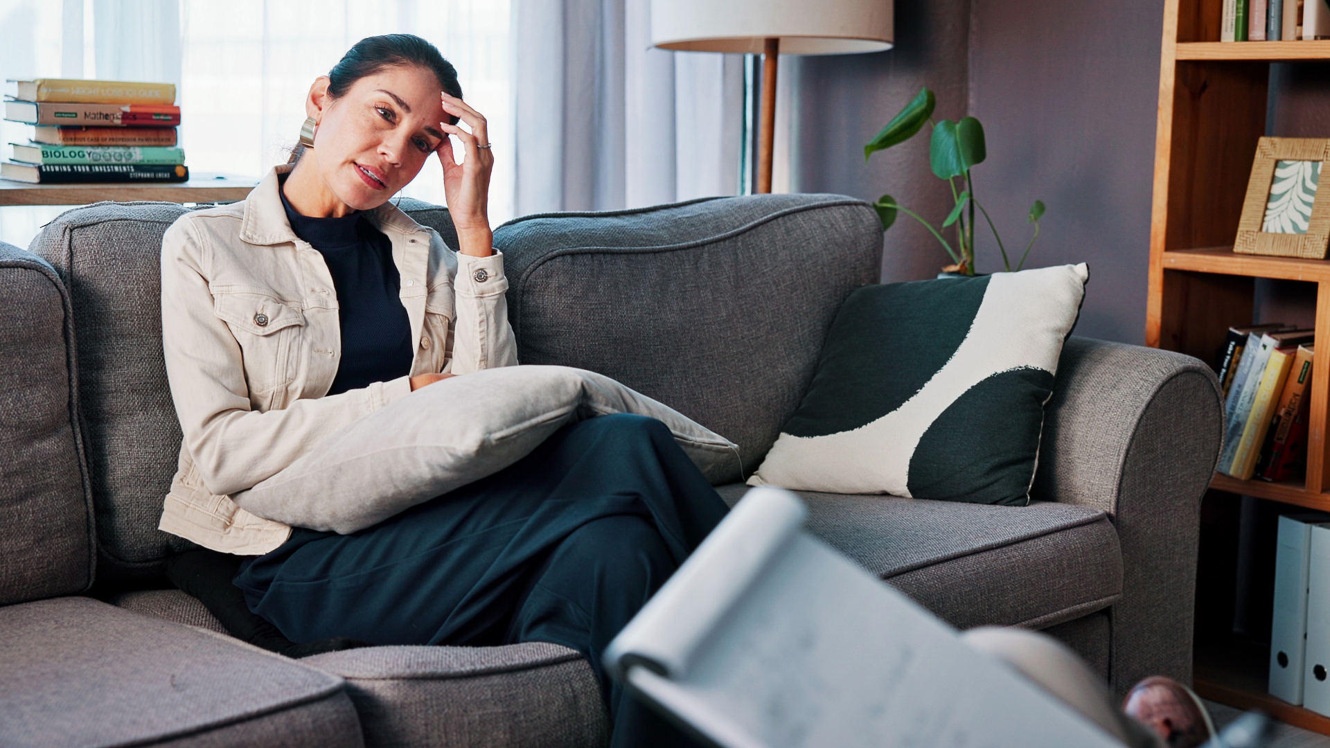 Mid-career woman reflecting on personal and career reinvention.